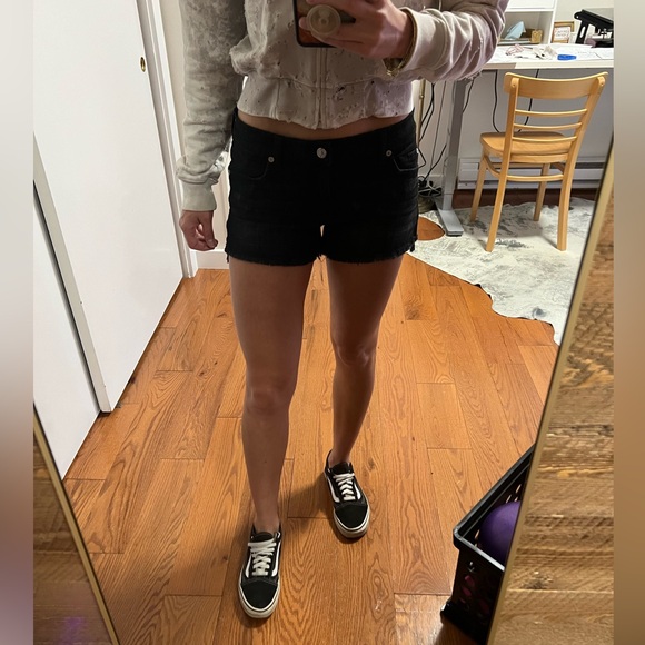 7 For All Mankind Mid-Rise Cutoff Shorts in Black - Picture 8 of 15